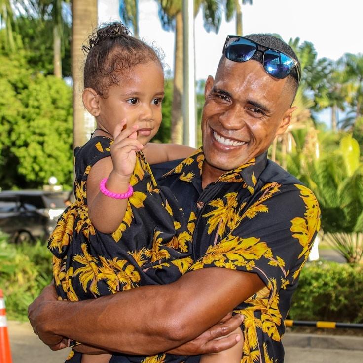 Asha Rao, Lead Design Curator at Adaptive Know Ledgehub, reviewing corporate floral arrangements